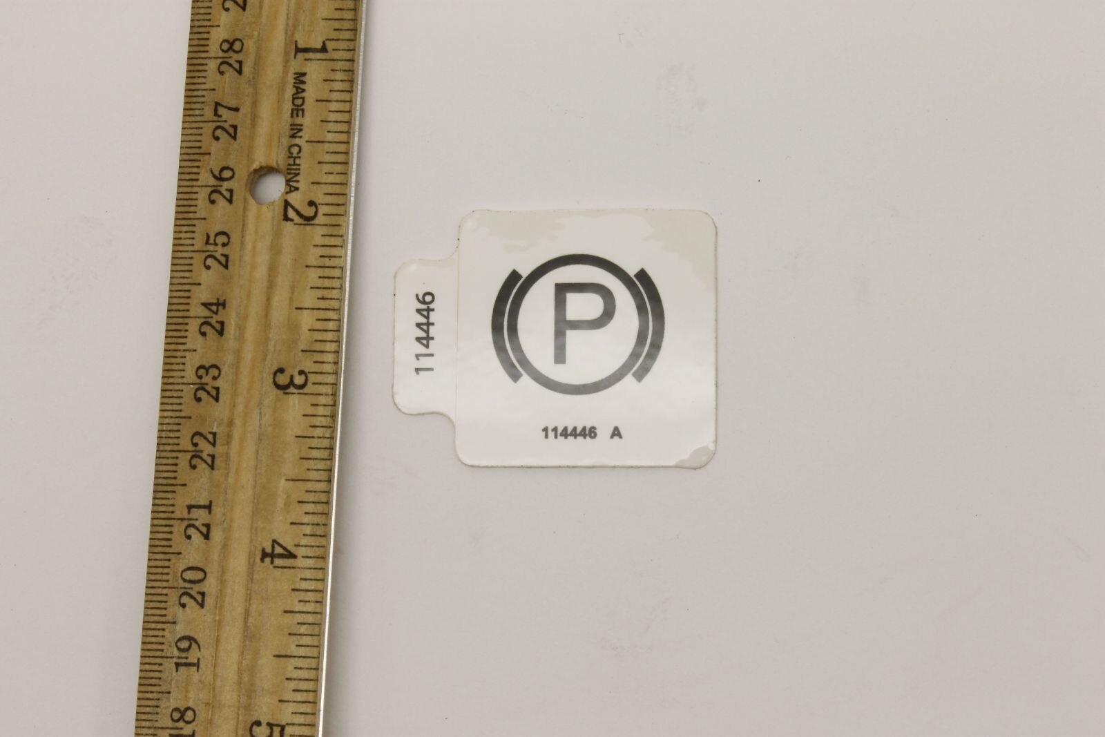 Genie Part # 114446GT – Decal, Label, Parking Brake